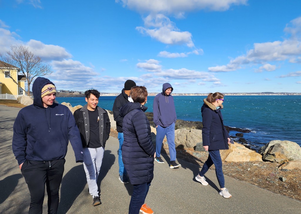 Manresa Retreat Spring 2023 group of students walking oudoors