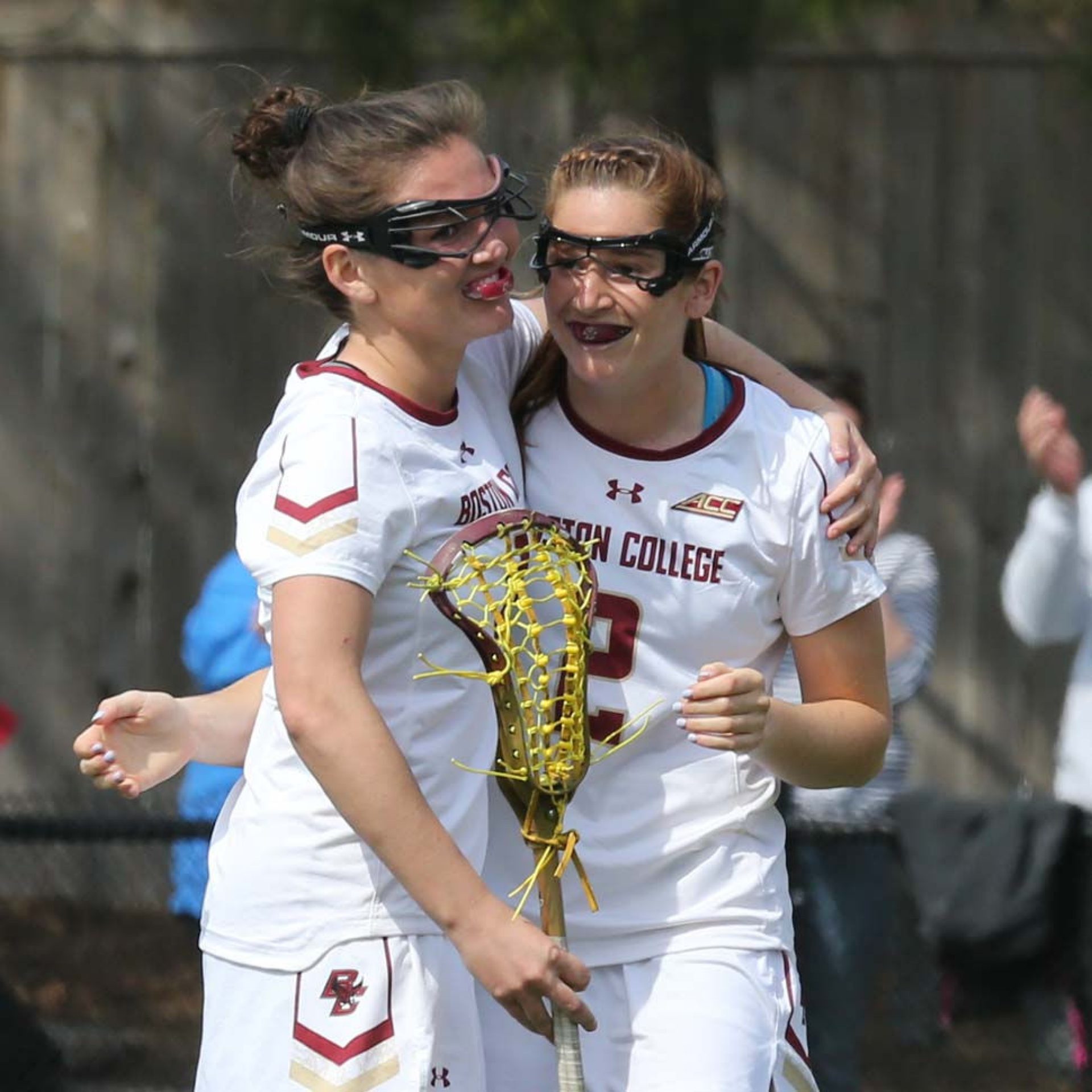 Kenzie Kent and Sam Apuzzo embrace in celebration.