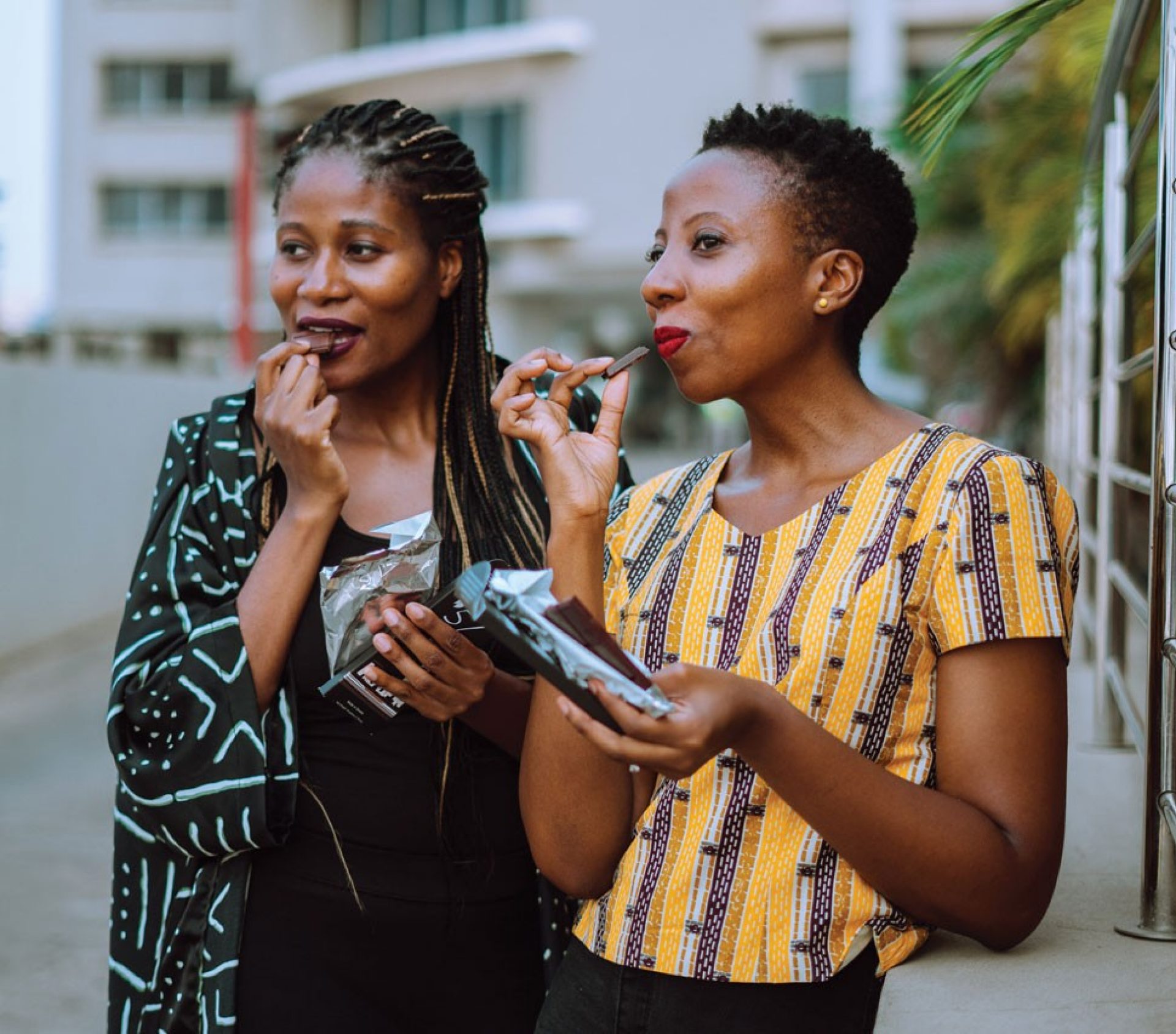 Photo of Priscilla and Kimberly Addison enjoying their chocolates