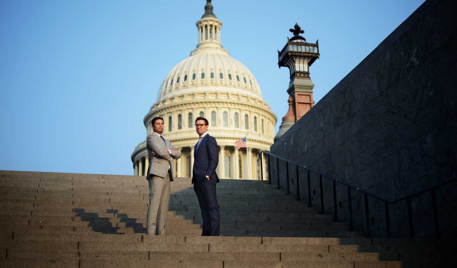 Lou Manzo ’06 and Brendan Downes ’07 photographed at the US Capital Building