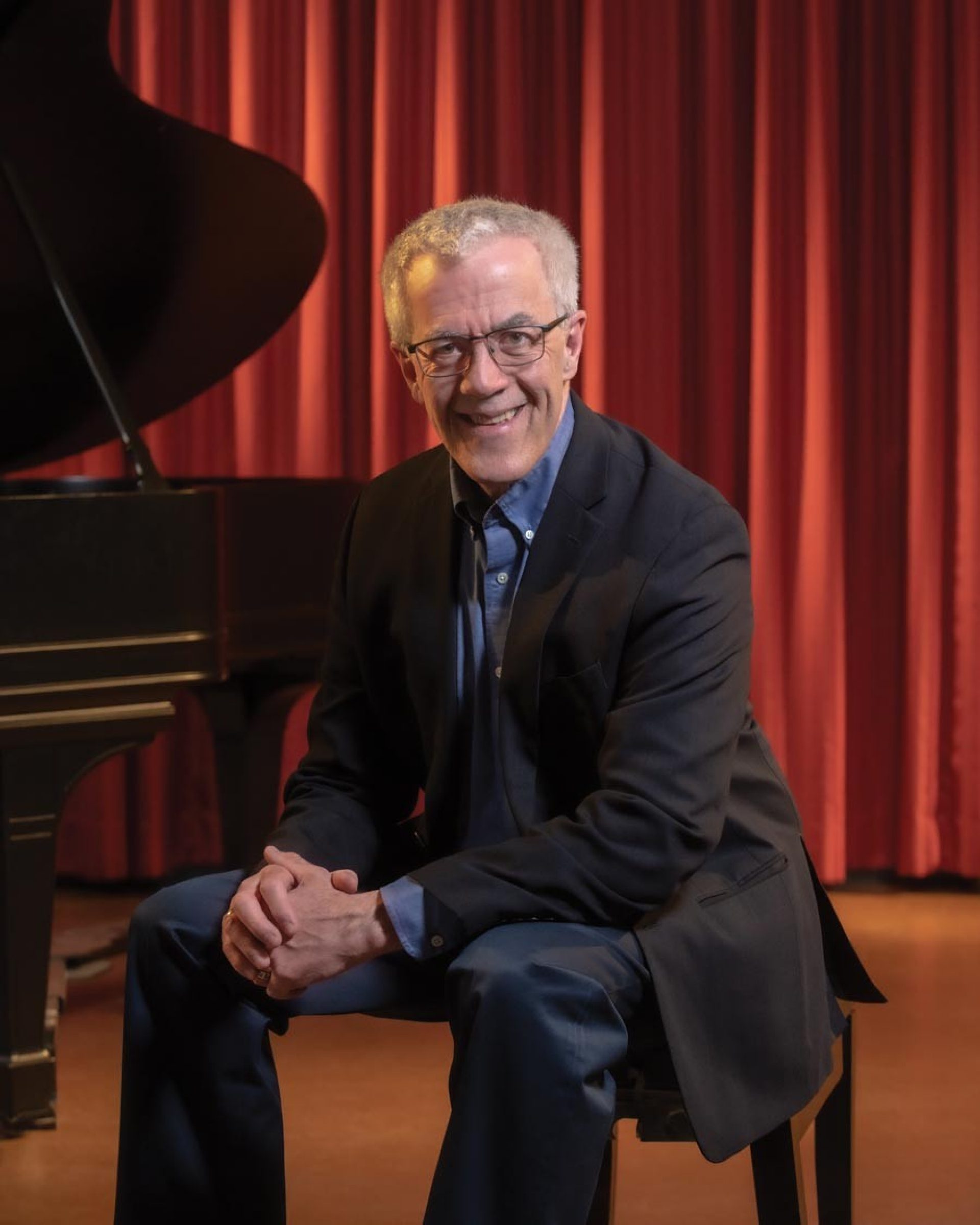 Photo of John Finney in practice studio