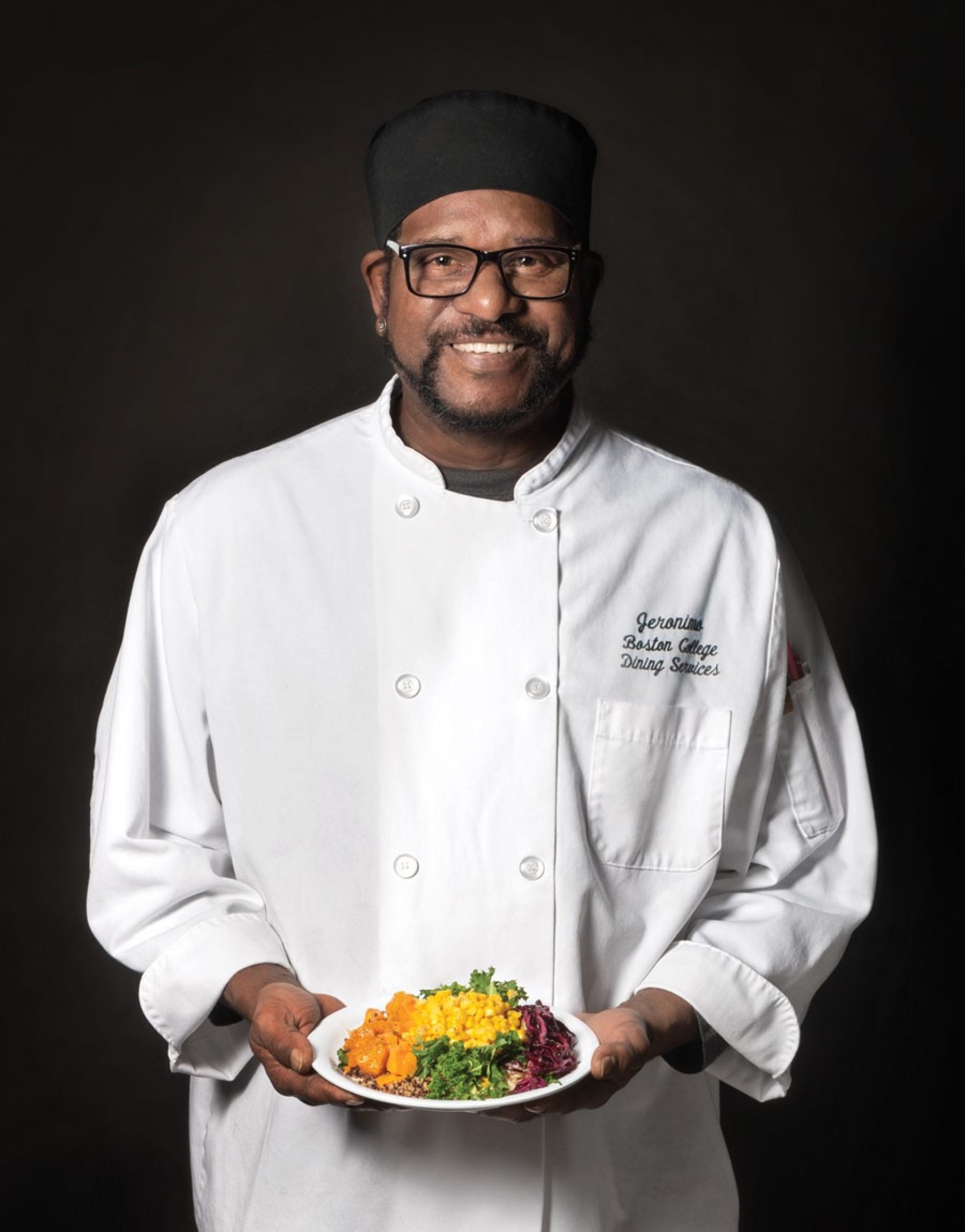 Photo of Jeronimo Colon Cora holding a plate of food