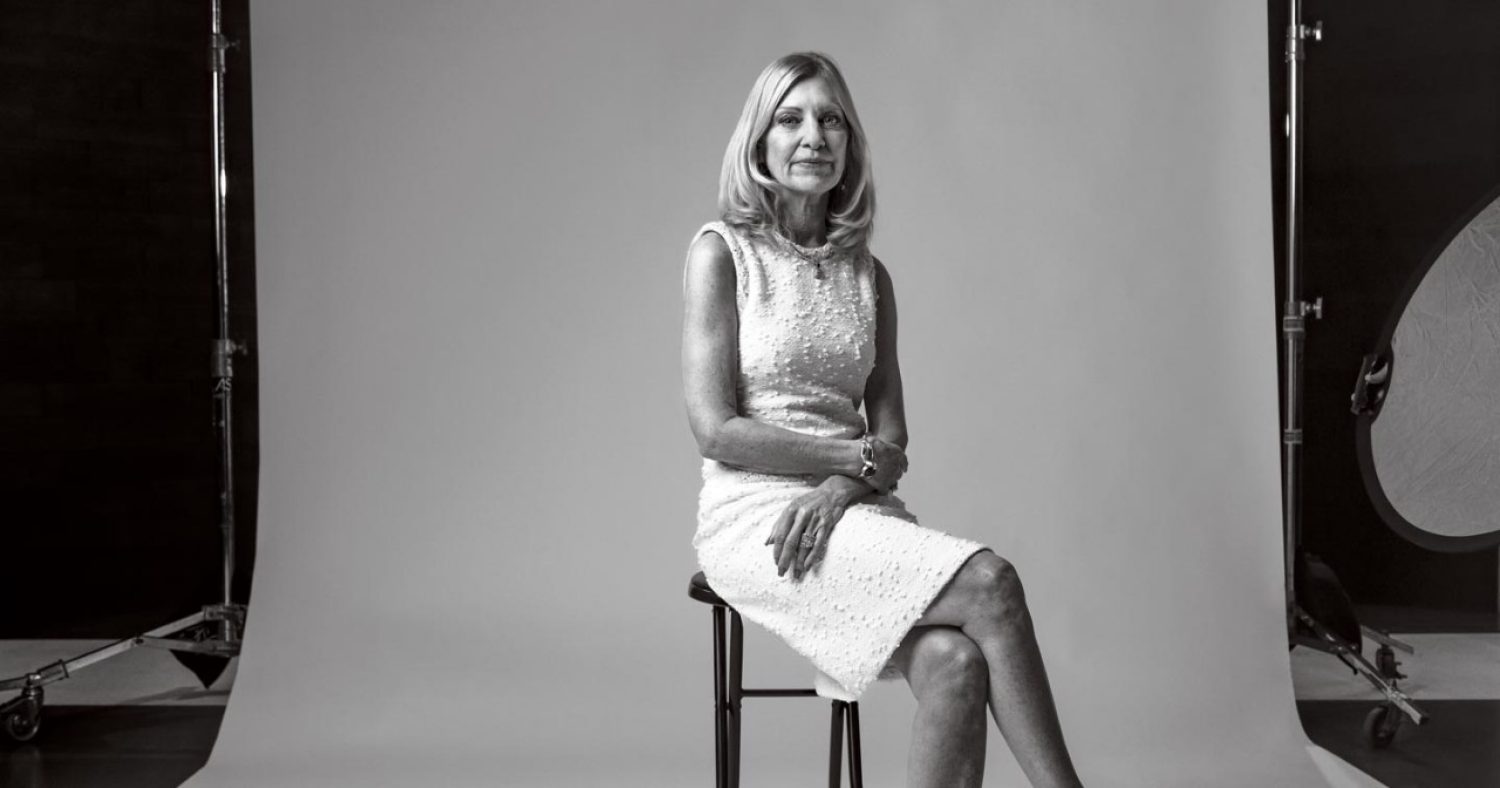 Photo of Karen Lynch seated in a studio setting