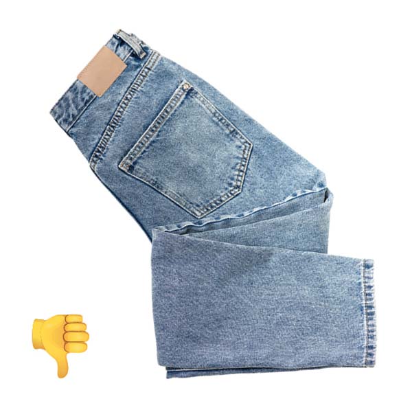 Folded acid wash jeans with a thumbs down symbol