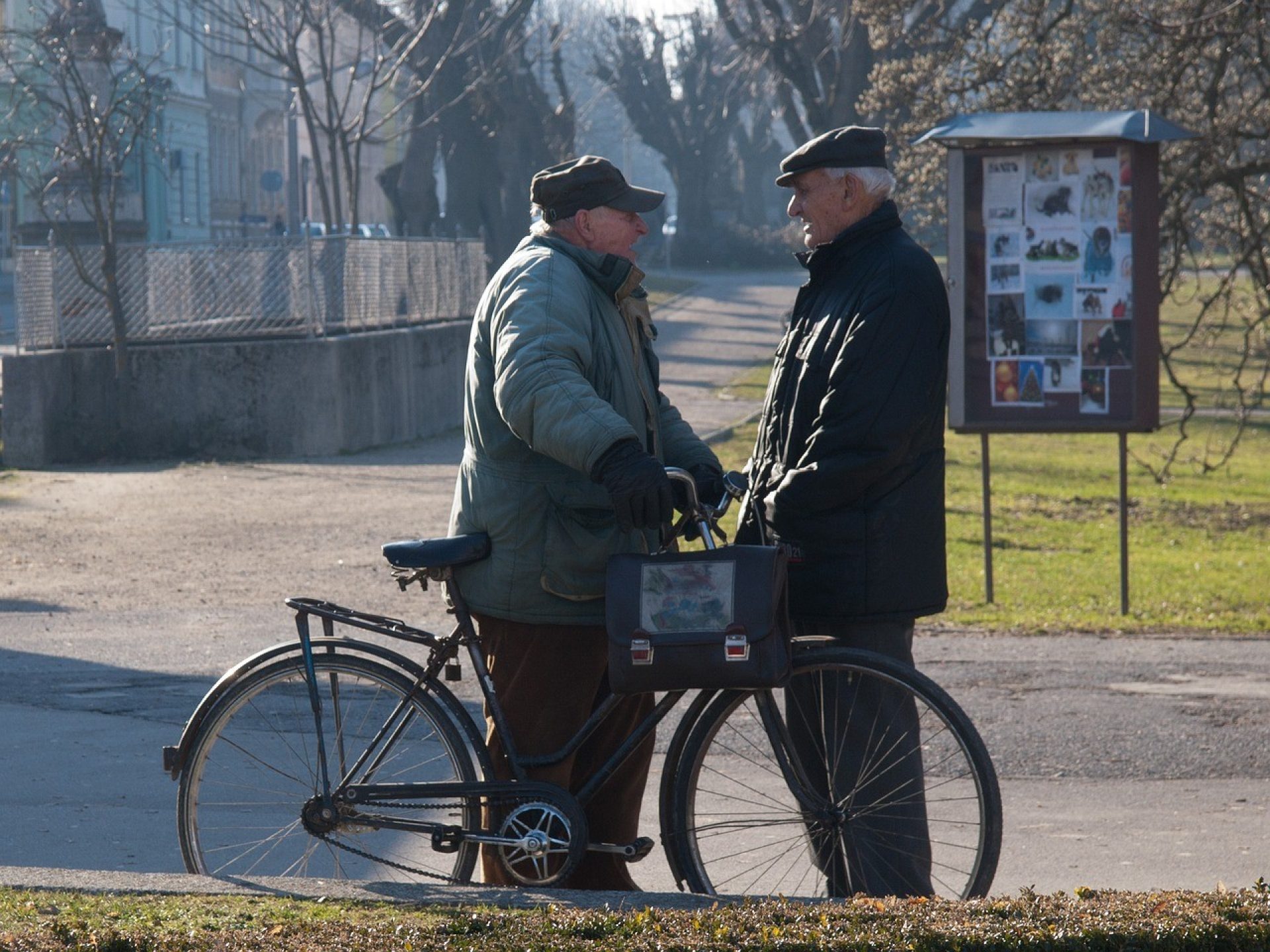 two older people talking