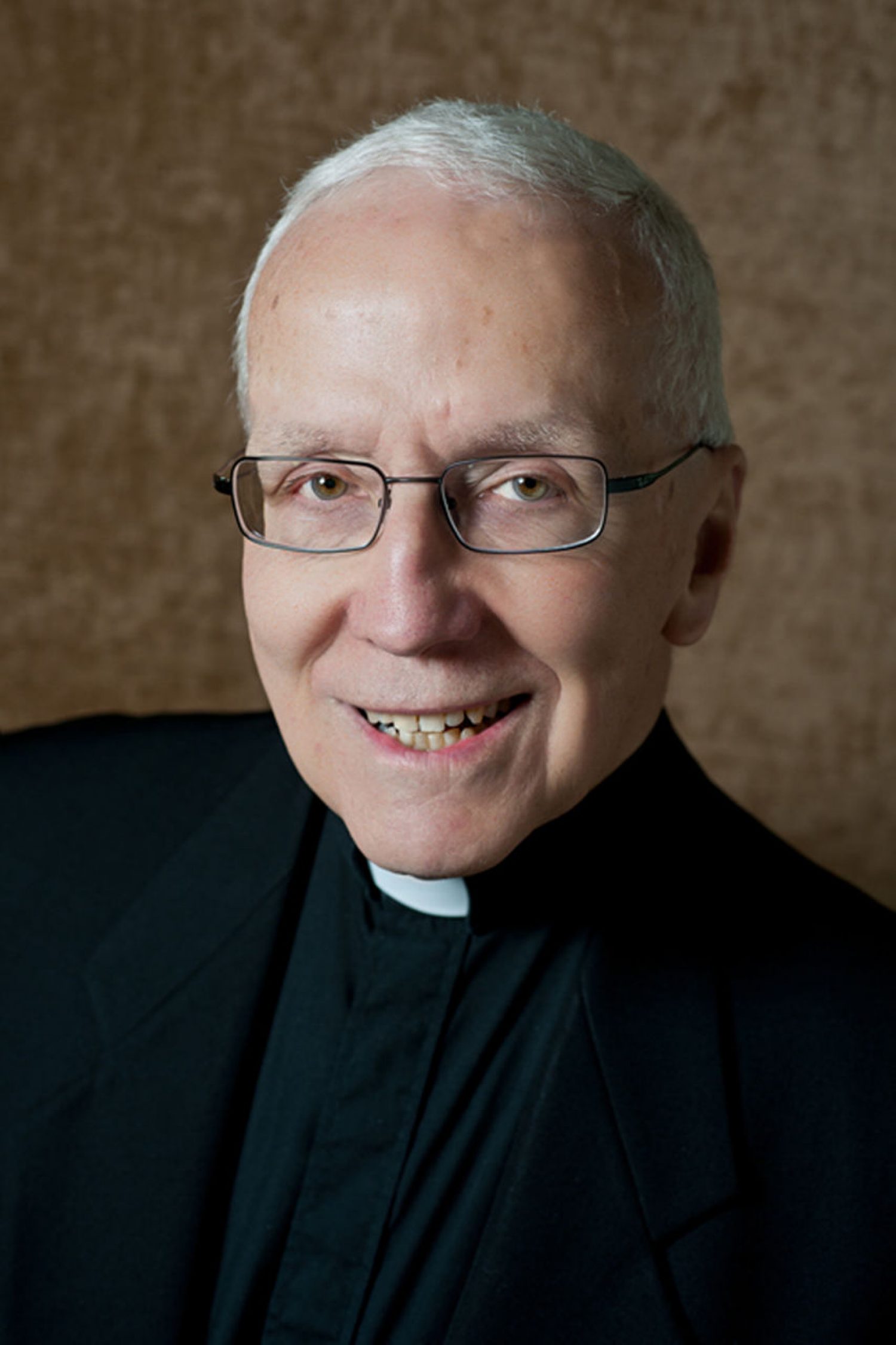 a priest in clerical collar
