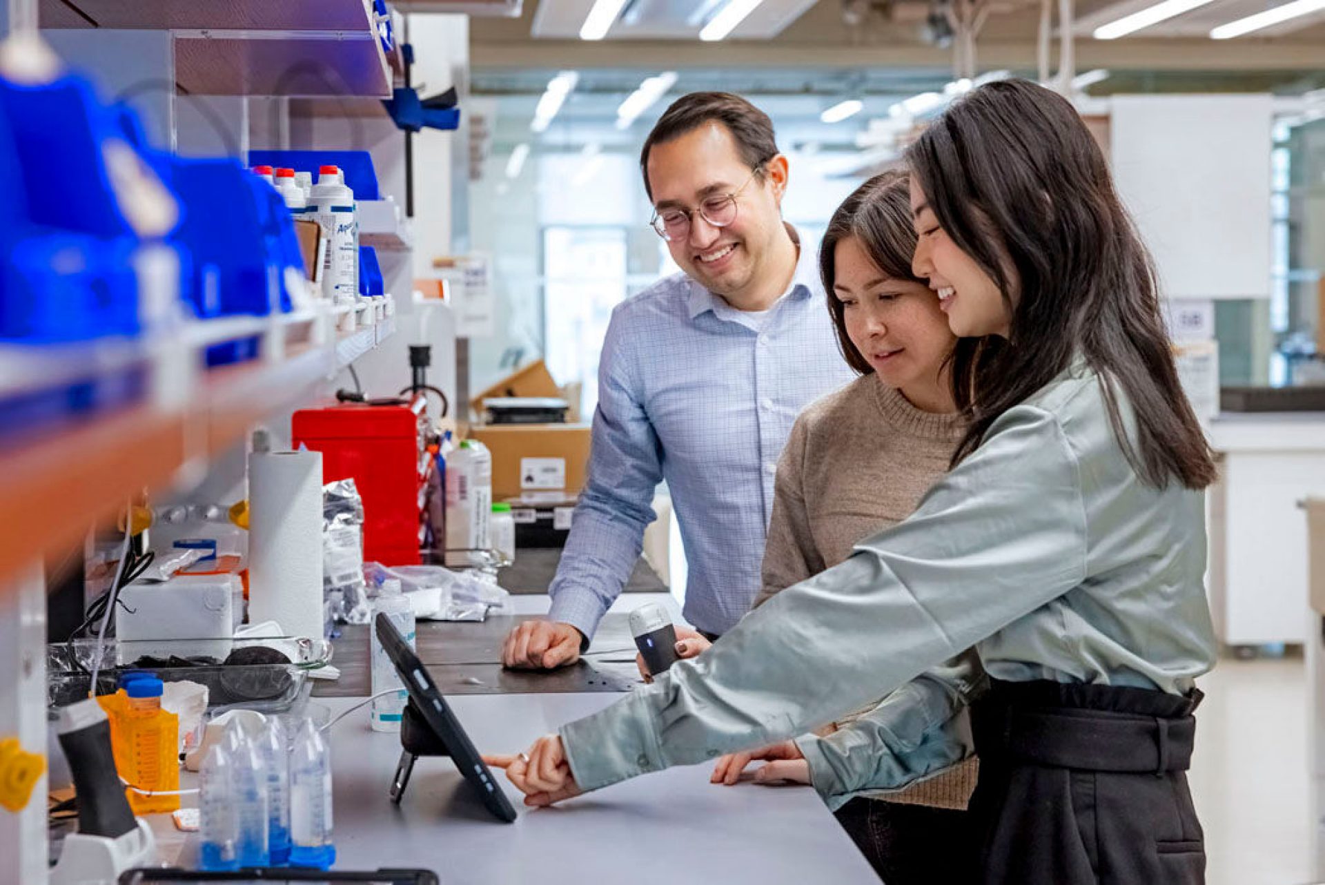 Bryan Ranger and two students in a lab