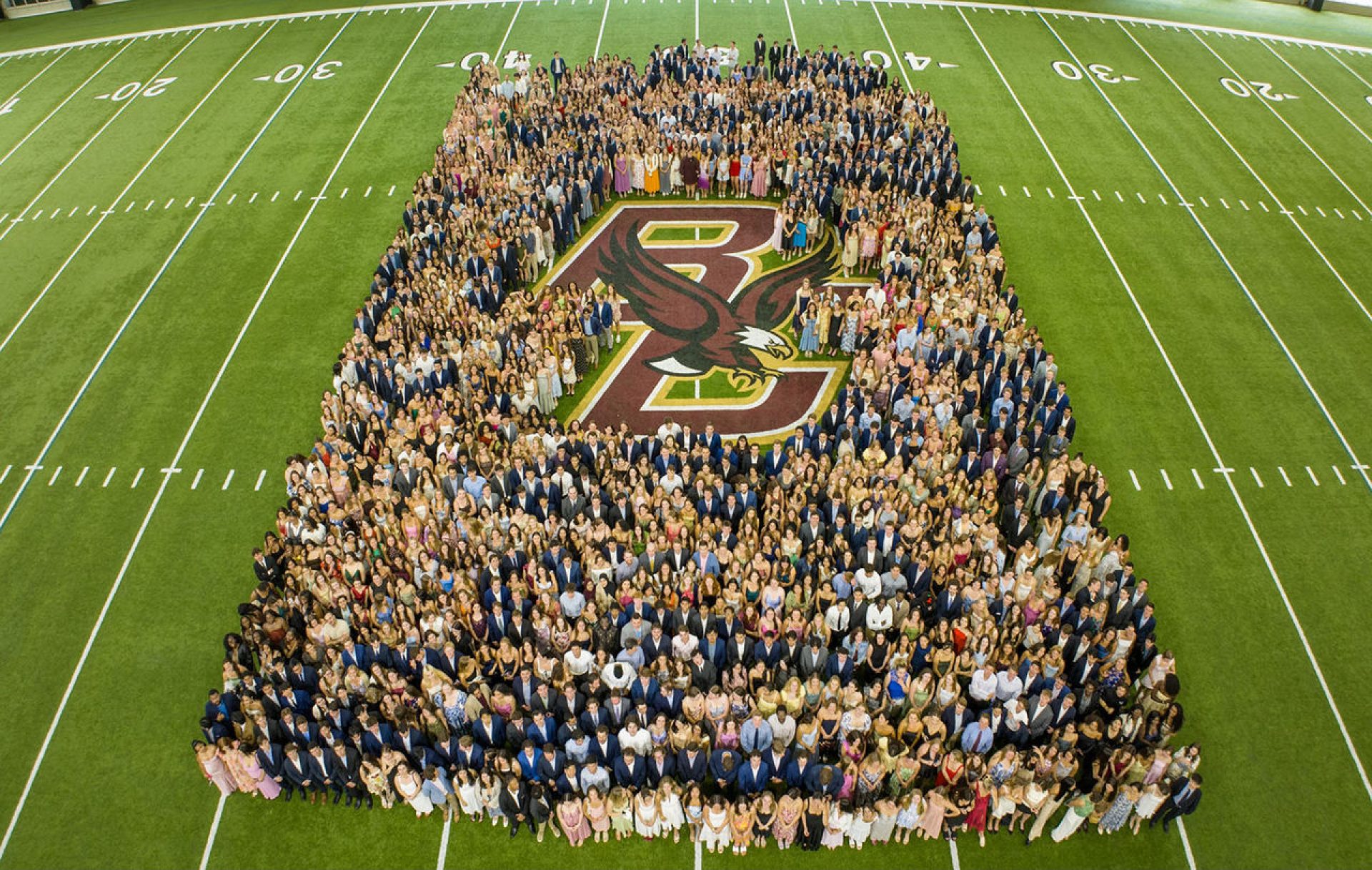 the senior class posed around the BC logo 