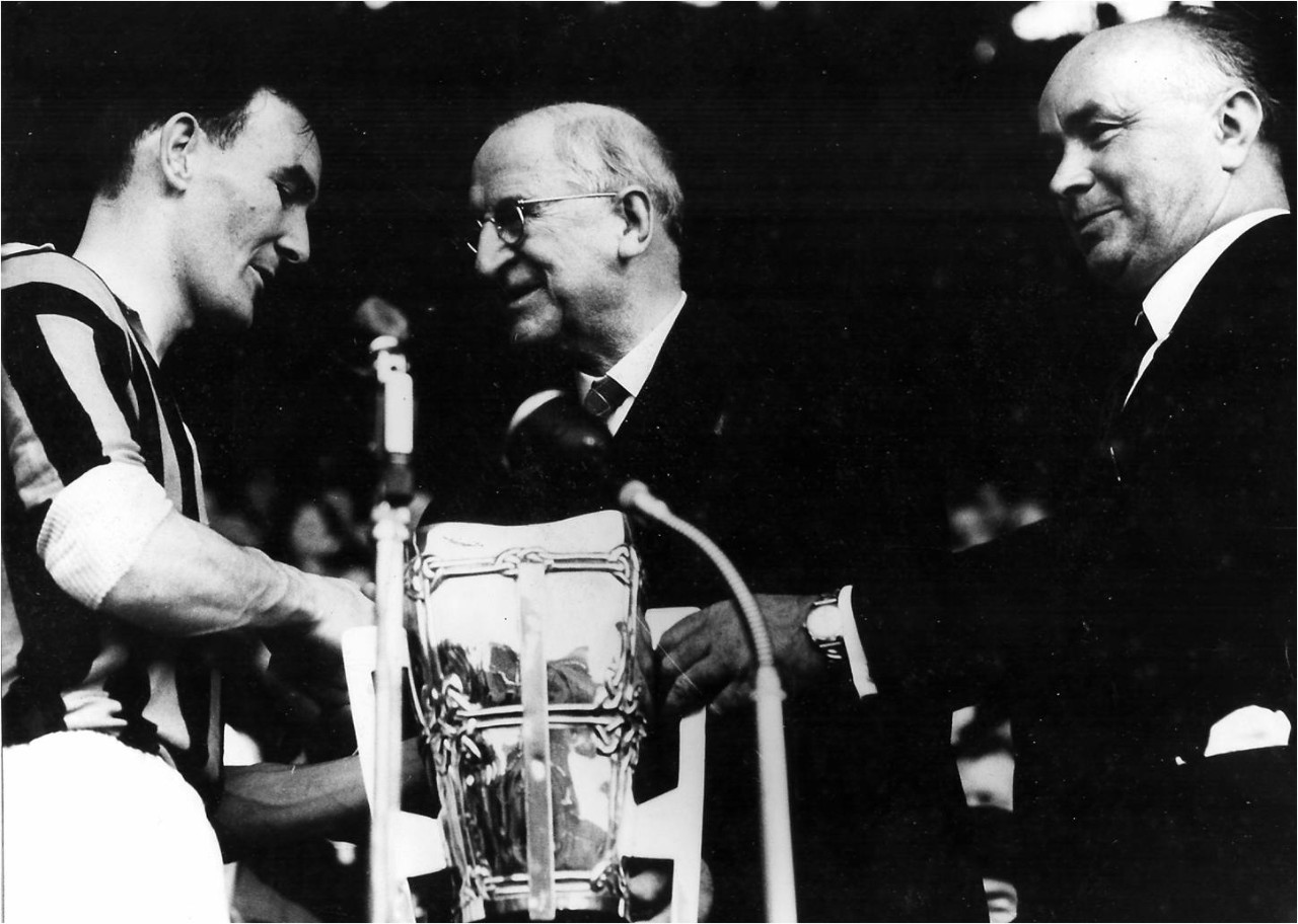 Team captain Seamie Cleere is presented with the Liam McCarthy Cup by Eamon de Valera after the 1963 All-Ireland final.
