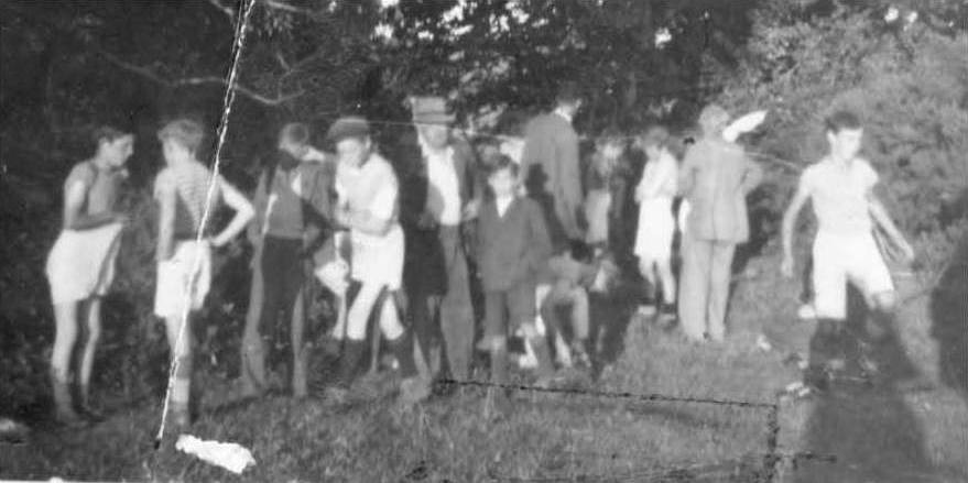 A group of people standing outside