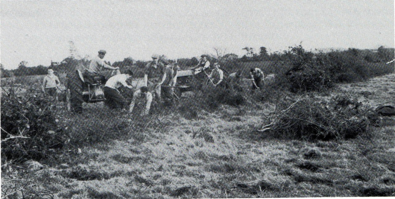 Local club members working hard to level ditches for Cornafean's new grounds in 1961.