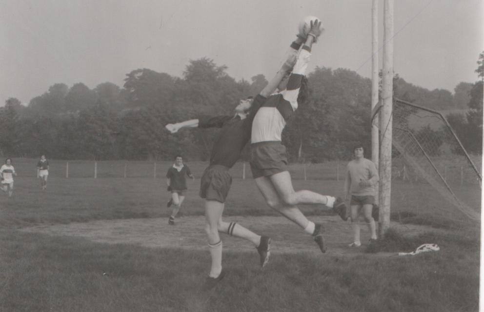 A high ball is contested during a match in Ballinascreen.