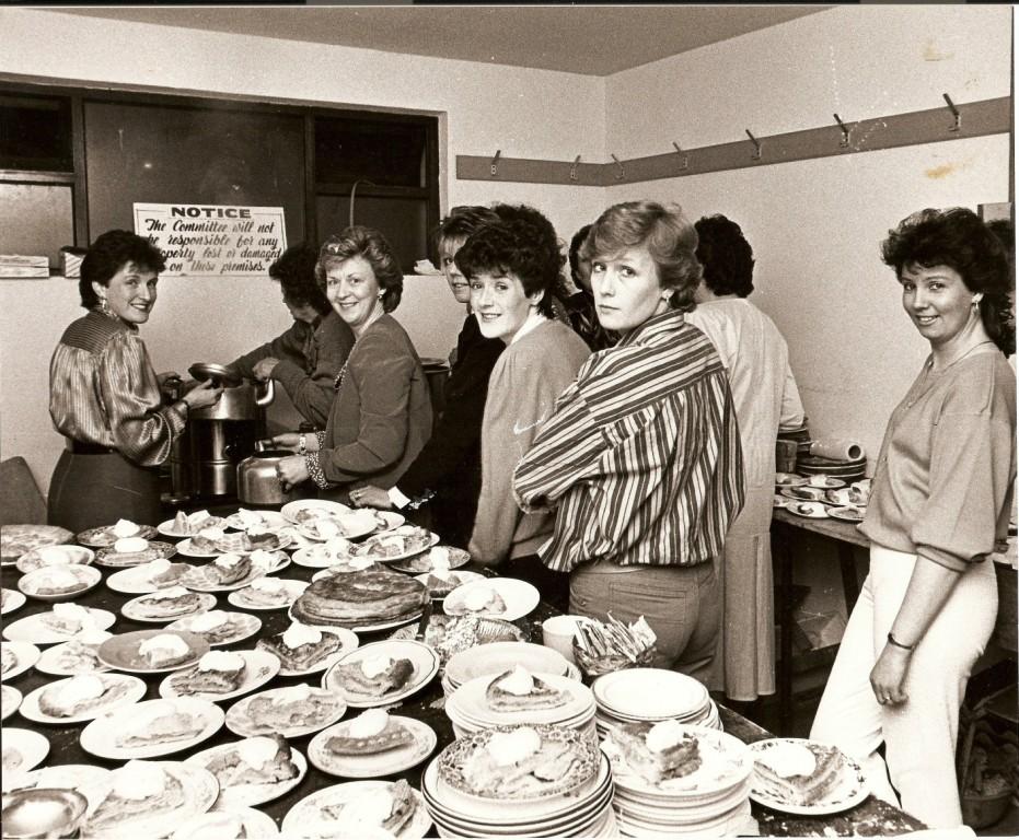 One of the more traditional roles of women in the GAA club — the Ladies Committee of Naomh Malachi GFC, Co. Louth, looking after the catering at the opening of the new clubrooms.
