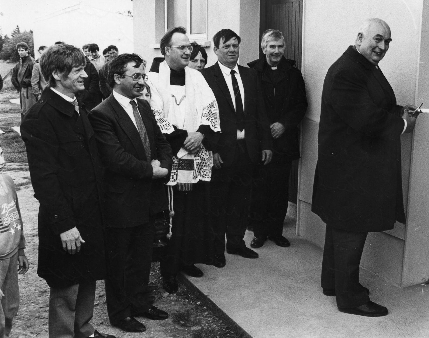 Jack Boothman, one of the few high-ranking Protestant GAA officials, presides at an official opening with members of the Catholic clergy. Boothman served as President of the Association between 1994 and 1997.