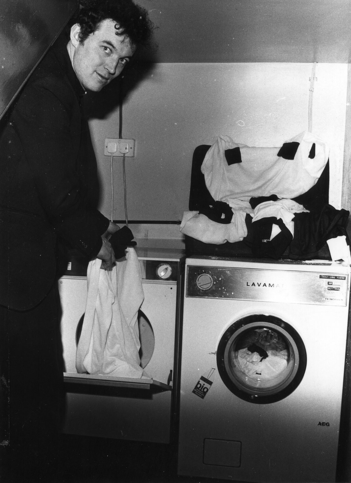 Despite their prominence on major ceremonial occasions, much of the clerical involvement in the GAA was as regular volunteers: club and county officers, mentors, players, and even jersey washers, as in this photograph from Westmeath.