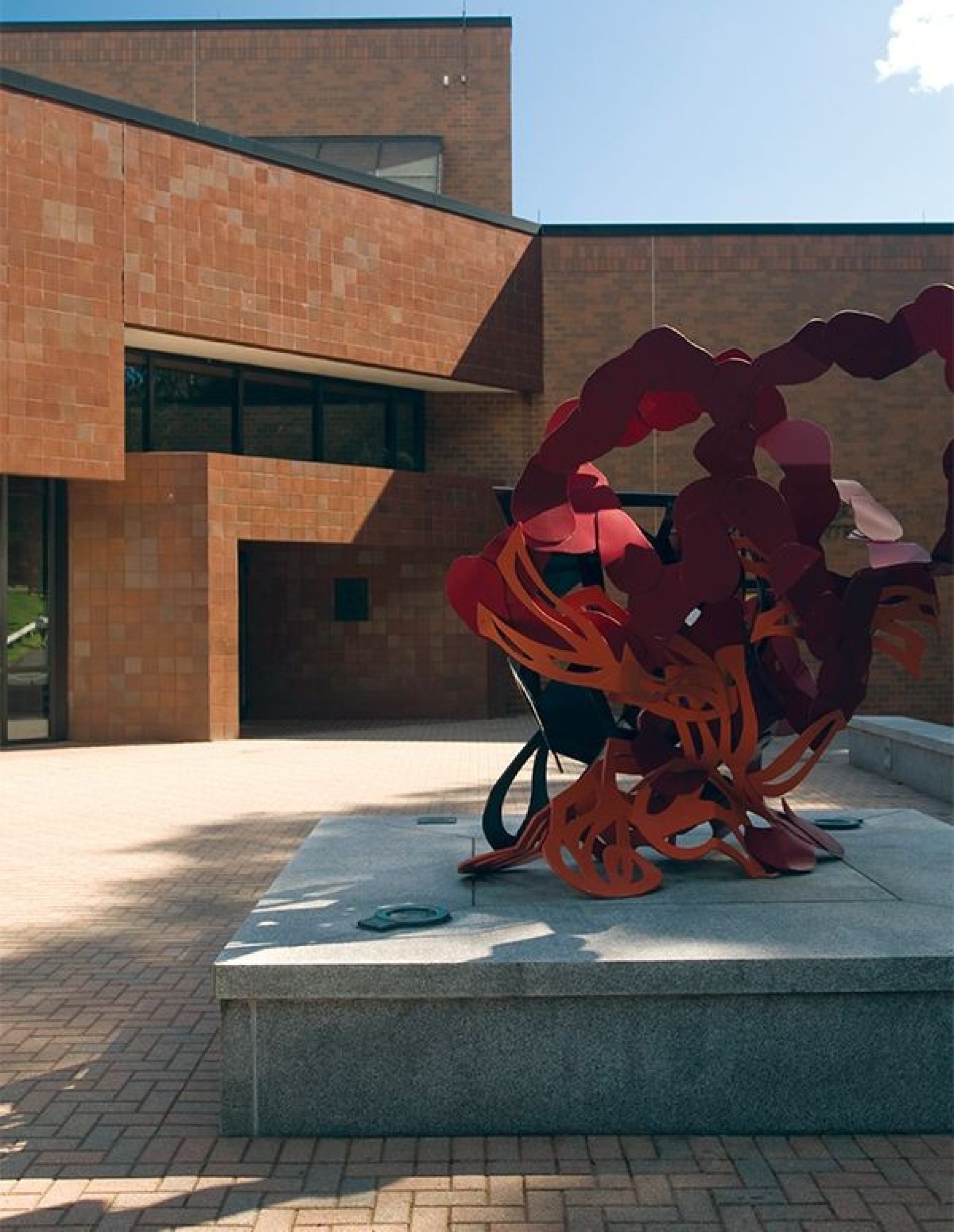 A red abstract sculpture