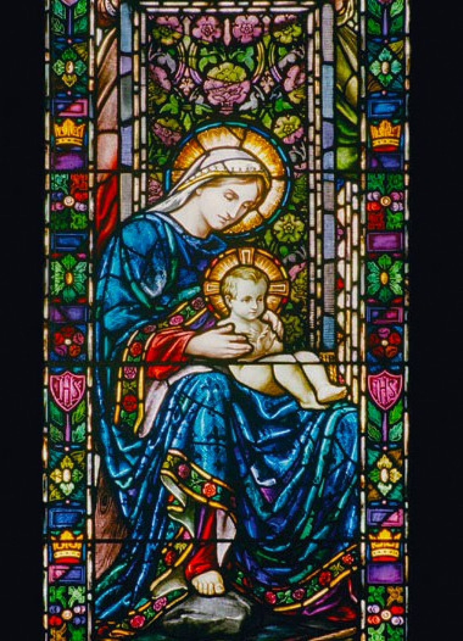 A stained glass window showing Mary and Jesus