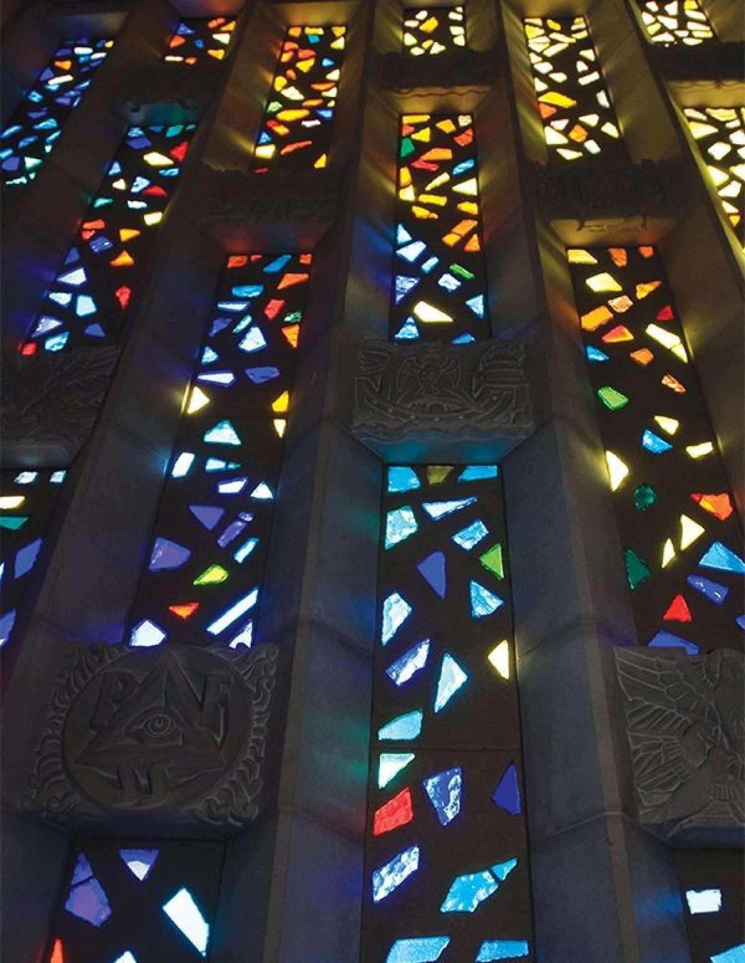 A wall of stained glass windows