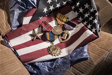 Photo of Photo of flag and medals