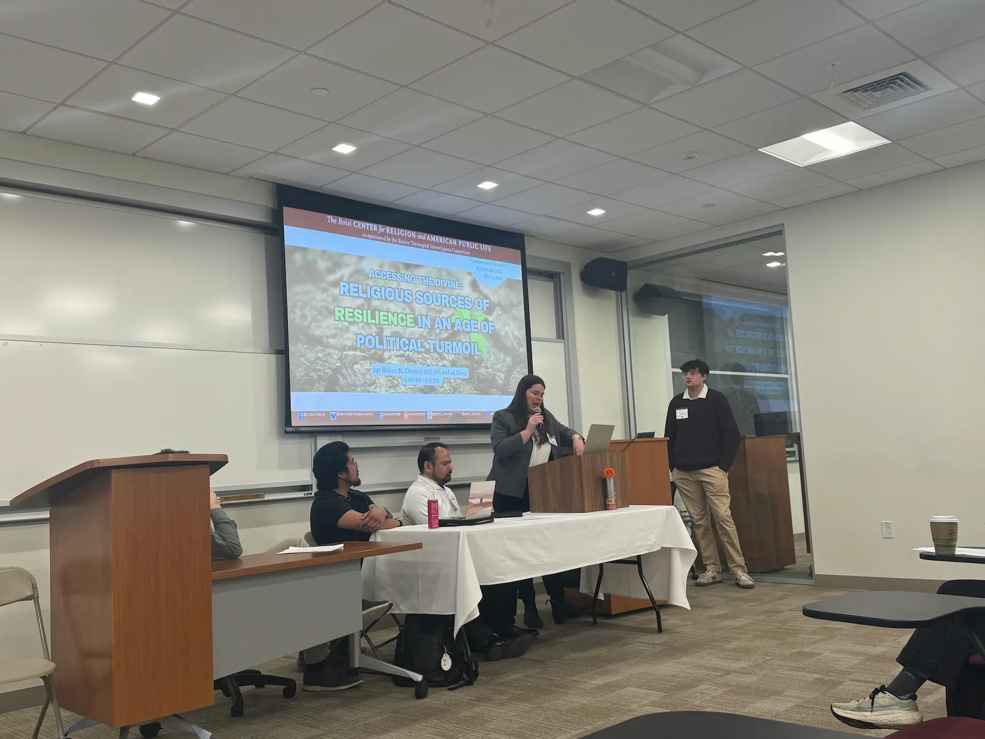 Thomas Elbourn III (behind the podium), M. Mookie C. Manalili, Josef Raoul Rodriguez, at the podium is Noël Grisanti (moderator) and William Adamczyk