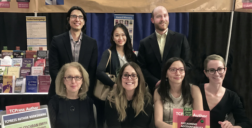 Co-authors at book signing