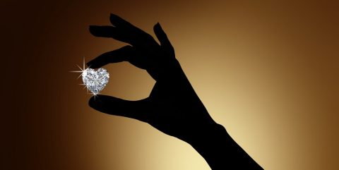 Hand holding diamond