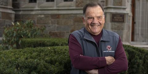 Al Travaglini standing on campus