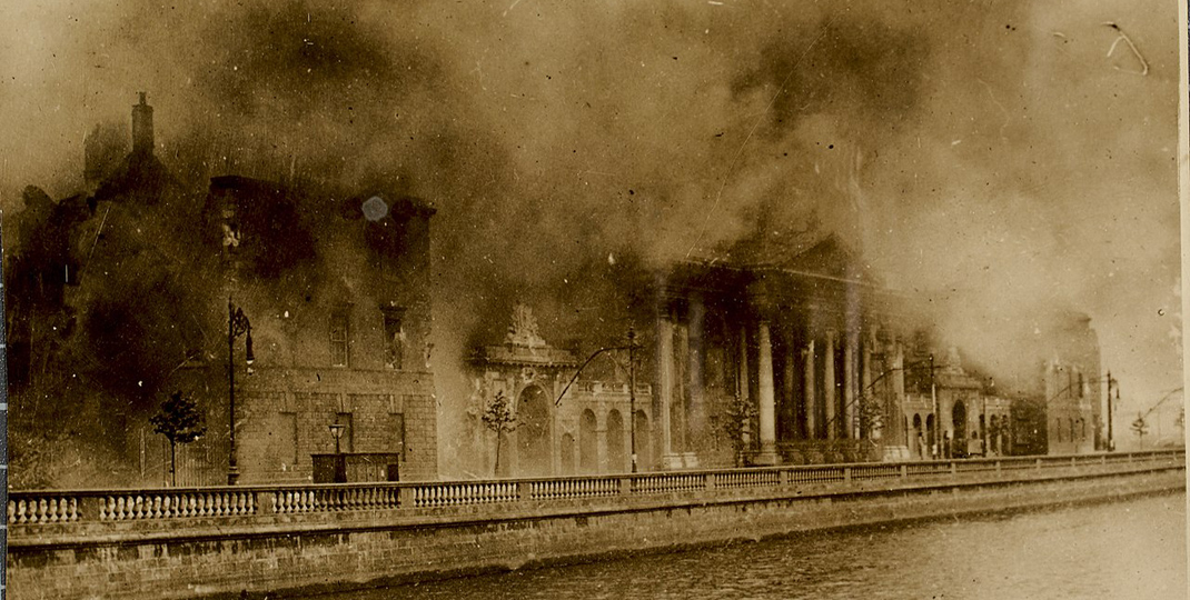 historical photo of a building on fire