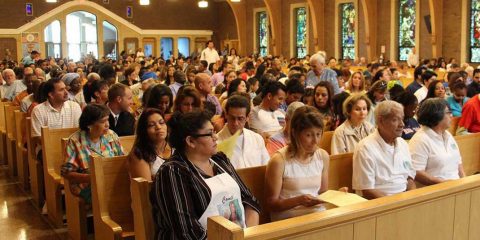 Hispanic Catholics at Mass.