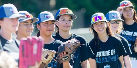 A group of female baseball players