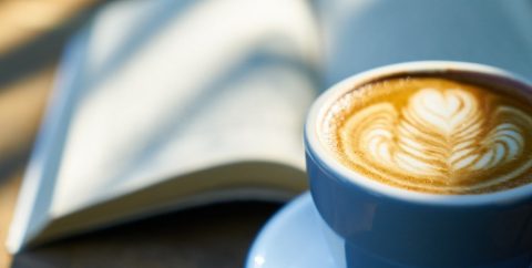 latte coffee cup and book