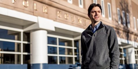 Matt DelSesto standing in front of the Suffolk County House of Correction