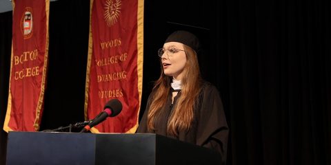 Lidia Carvalho speaking at commencement