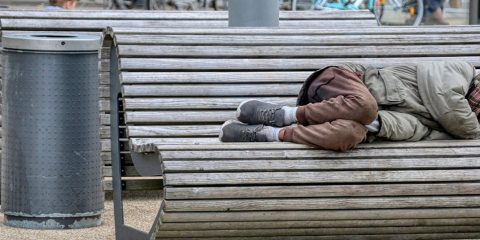 homeless man on bench