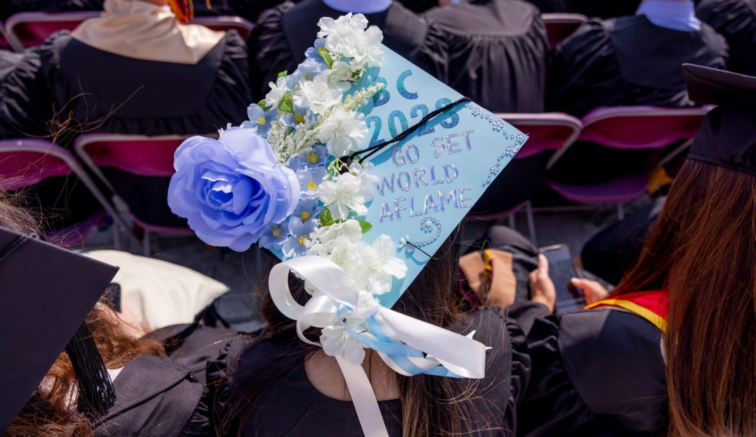 A graduation cap decorated, reading "Class of 2023: Go set the world aflame'