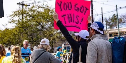 Spectators cheering at the Boston Marathon