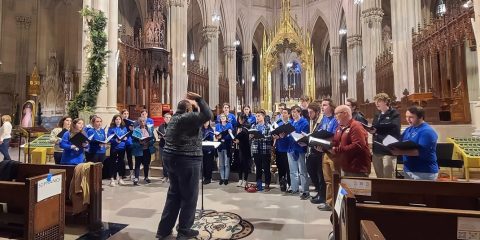 choral group at rehearsal in a church