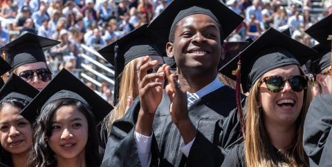 Cheering graduates