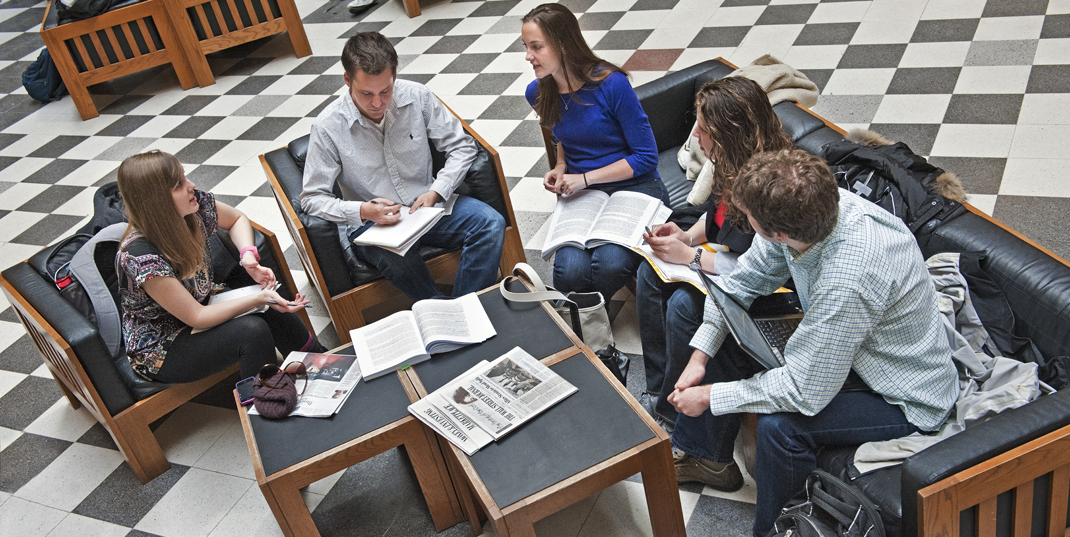 Students studying in a group in Fulton Atrium