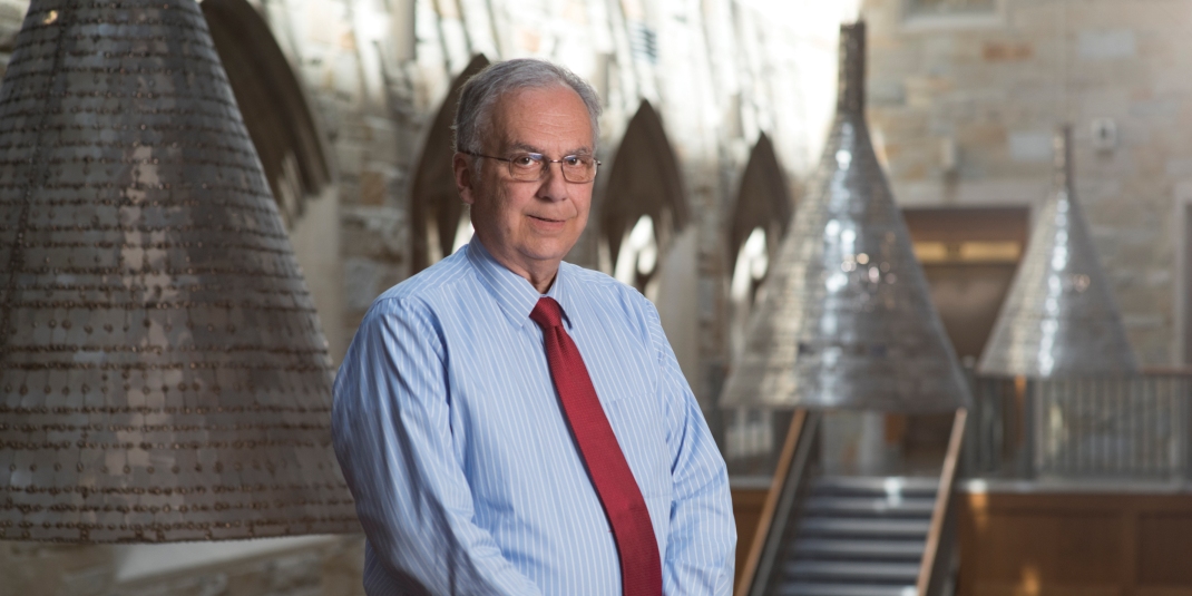 Dick Keeley poses in the Fulton Atrium