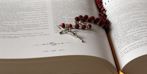 rosary and Bible