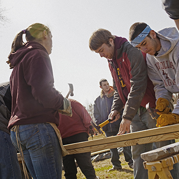 Boston College students spend their spring break volunteering with Habitat for Humanity and other community-based outreach organizations in Exmore, Virginia on Tuesday, March 6, 2012.