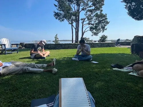 Students reflecting on a retreat.