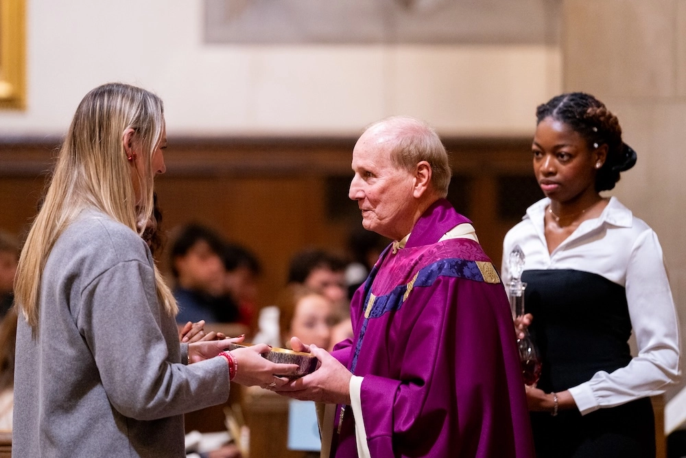 The presentation of Communion at a Boston College Mass.