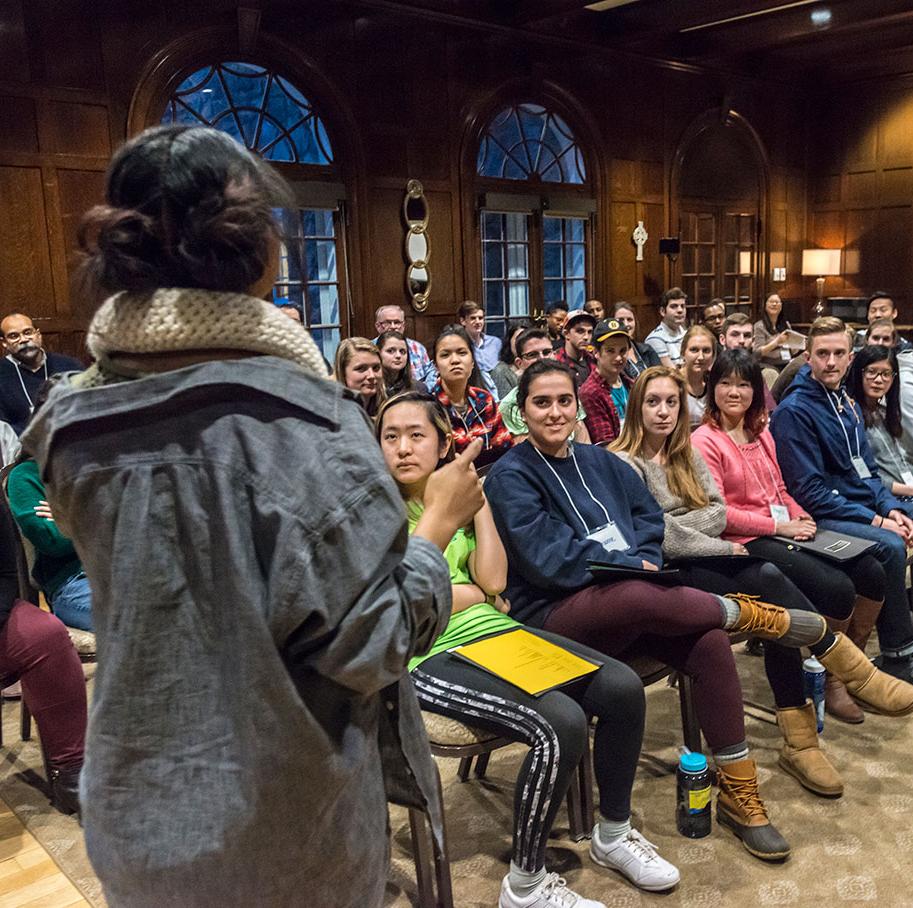 A student leading a conversation