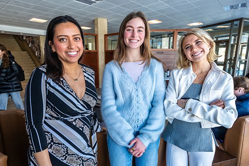 Juniors Marine Degryse (center) and Georgia Paris (right) spearheaded a fundraising effort to help Los Angeles-area wildfire victims. At left is Kendra Glenn, assistant director of the BC Volunteer and Service Learning Center, who helped the pair coordinate the campaign.