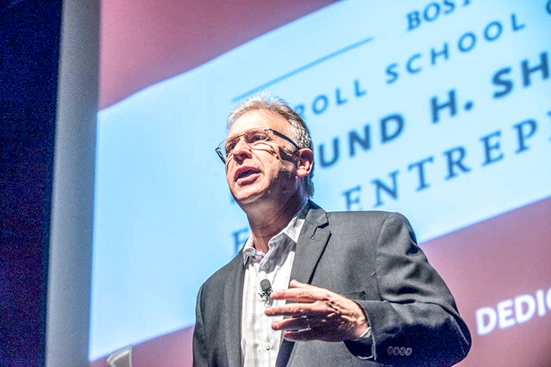 Phil Schiller speaking at a Shea center event