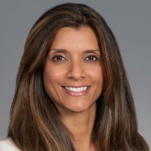 headshot of Rupal Poltak, a smiling Indian woman