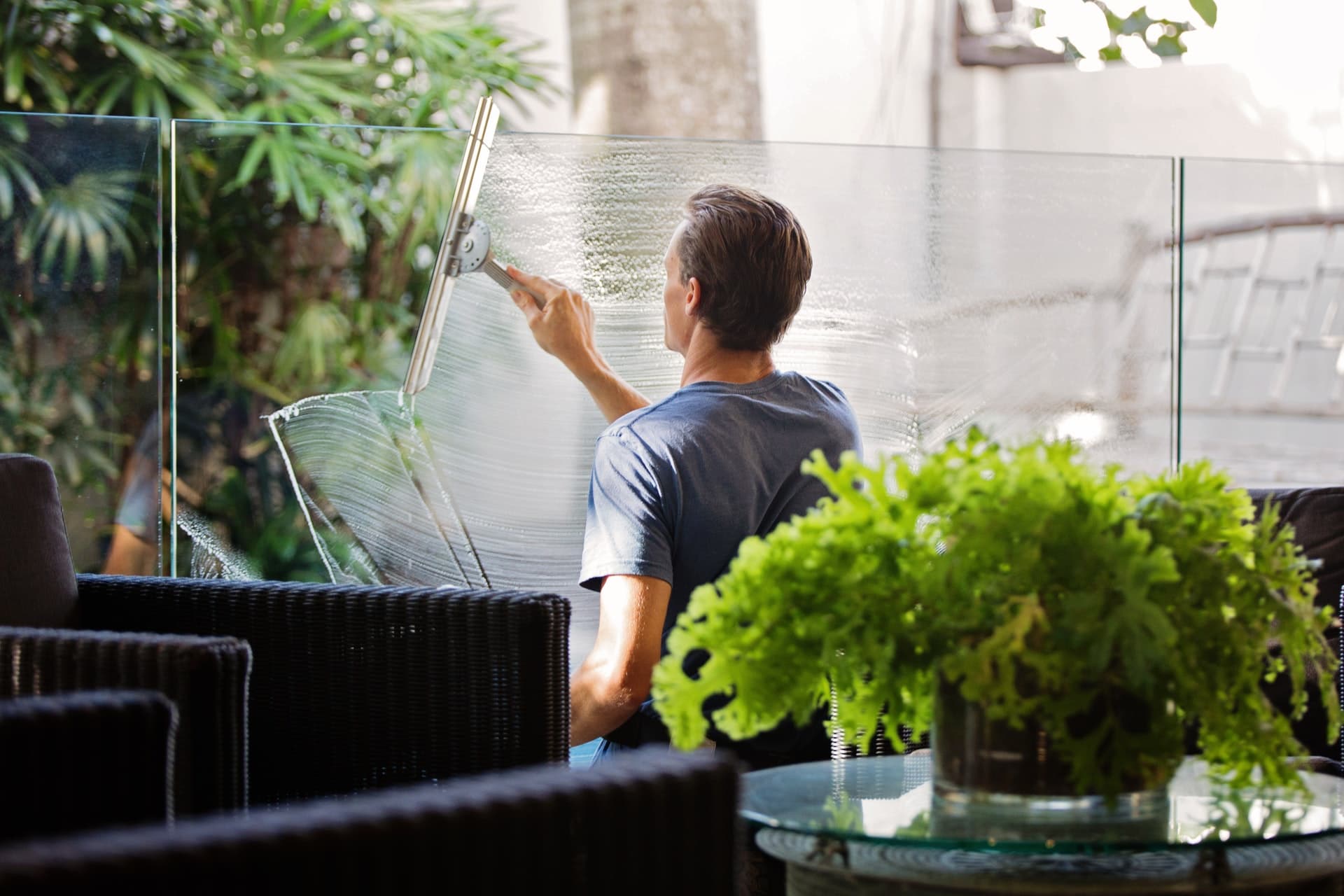 a man washes a window