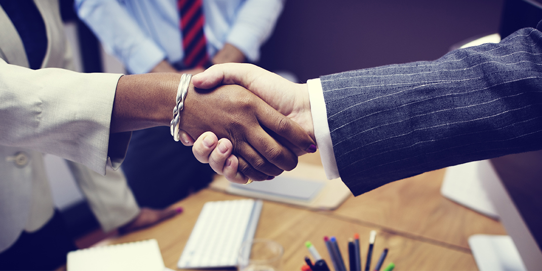 a handshake over a business deal